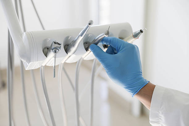 Professional Invisalign Clear Aligners technician working in St. John, IN